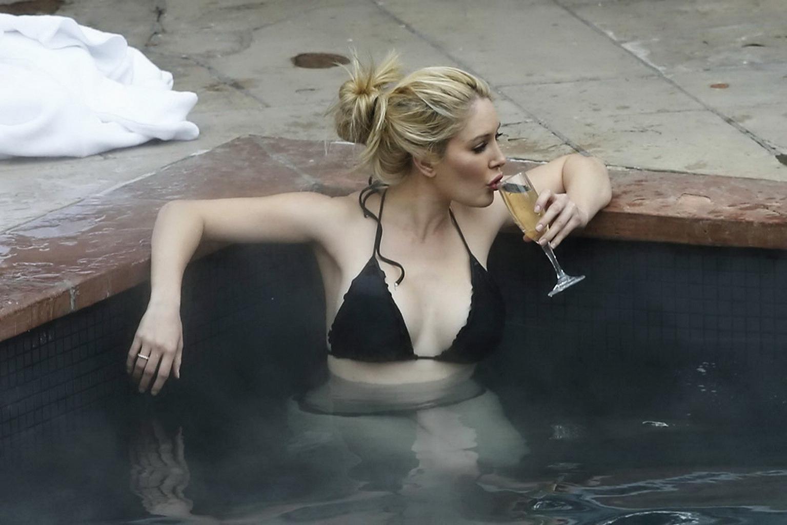 16P Heidi Montag busty in tiny black bikini in a hot spa during the vacation in Aspe