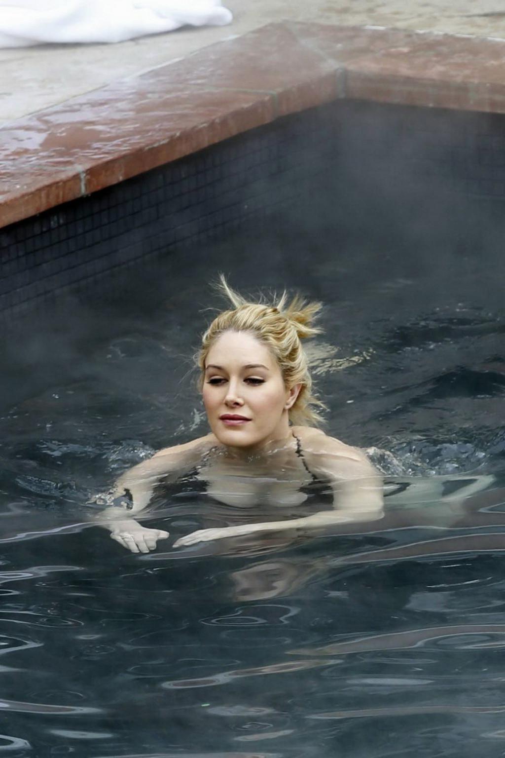 16P Heidi Montag busty in tiny black bikini in a hot spa during the vacation in Aspe