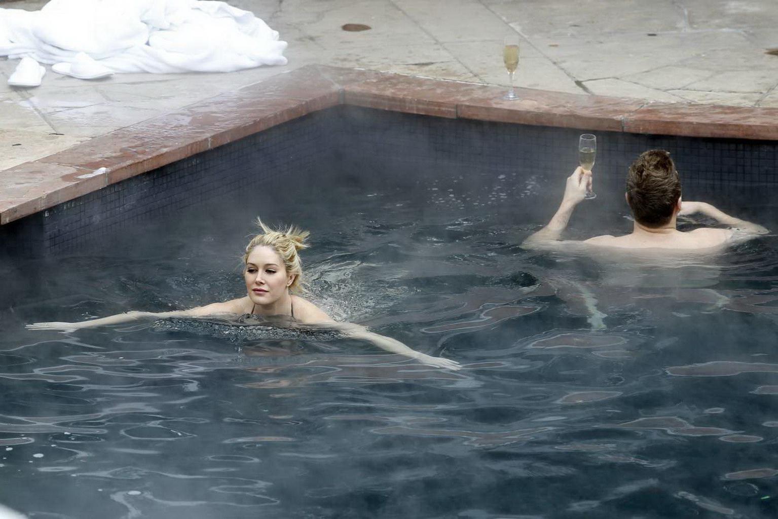 16P Heidi Montag busty in tiny black bikini in a hot spa during the vacation in Aspe
