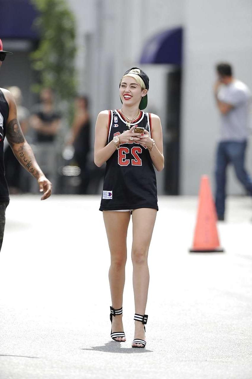 16P Miley Cyrus looking very sexy and showing nice butt