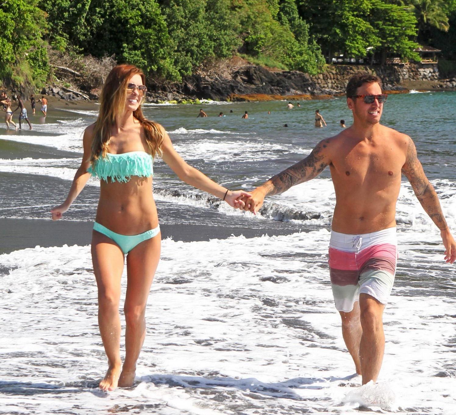 16P Audrina Patridge busty wearing various bikinis at the beach while on a vacation 