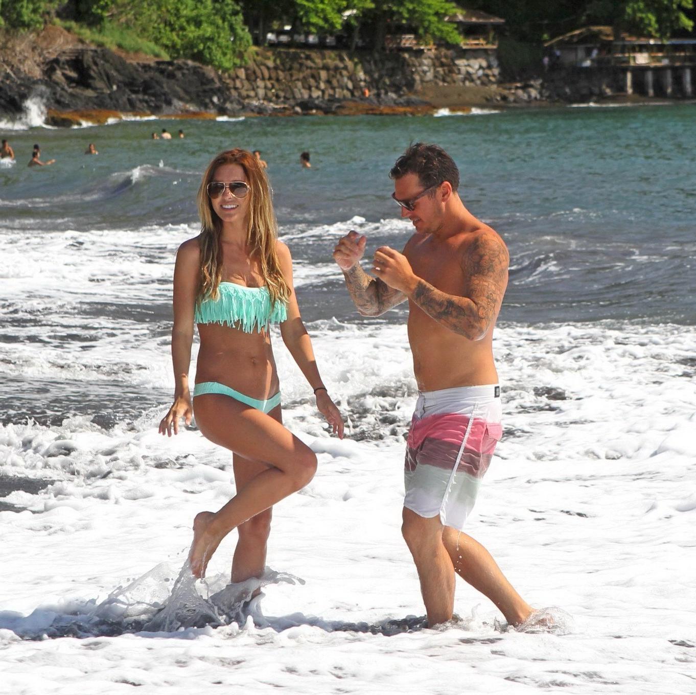 16P Audrina Patridge busty wearing various bikinis at the beach while on a vacation 