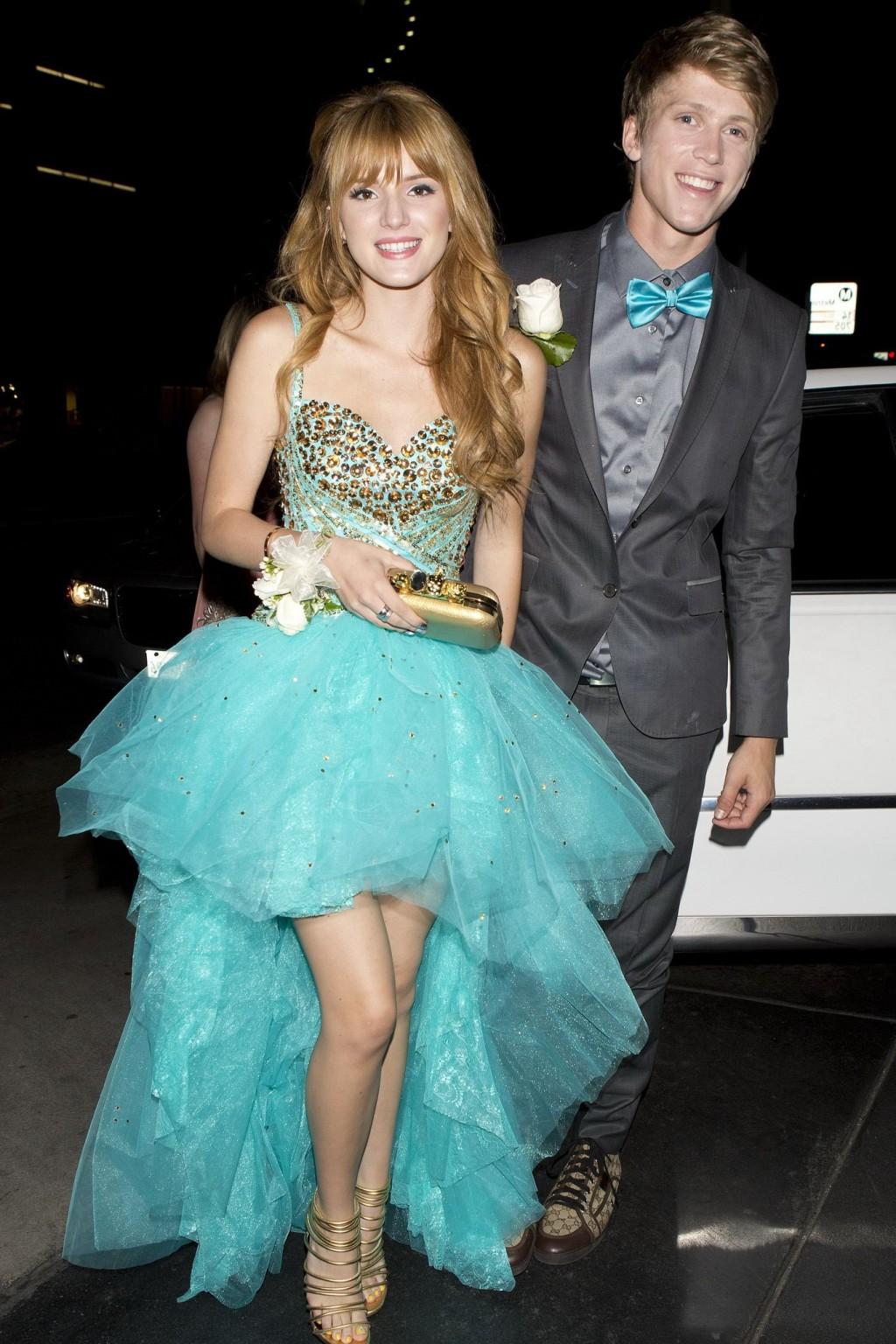 16P Bella Thorne cleavy and leggy in sexy dress arriving at a film promotion in Los 