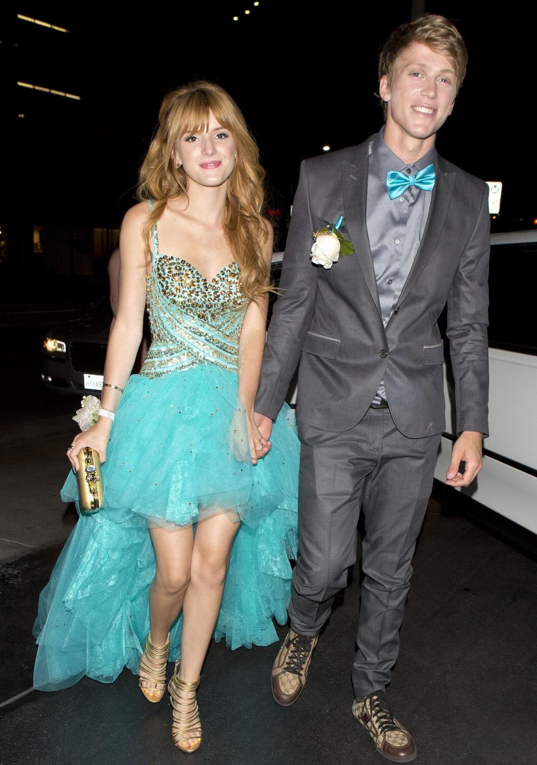 16P Bella Thorne cleavy and leggy in sexy dress arriving at a film promotion in Los 