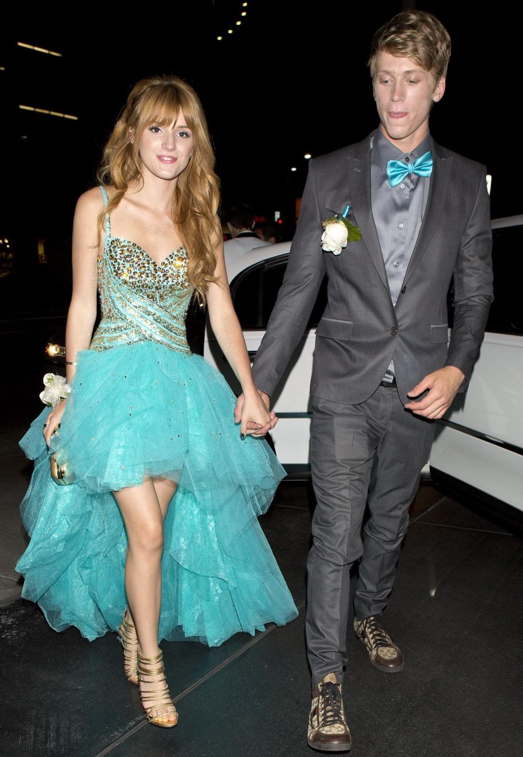16P Bella Thorne cleavy and leggy in sexy dress arriving at a film promotion in Los 