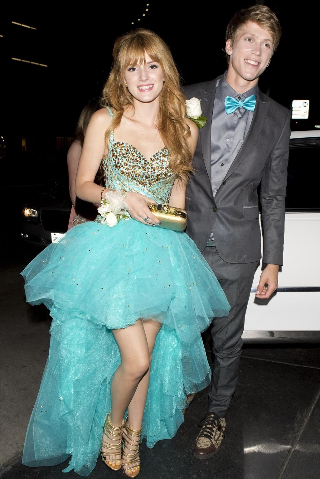 16P Bella Thorne cleavy and leggy in sexy dress arriving at a film promotion in Los 