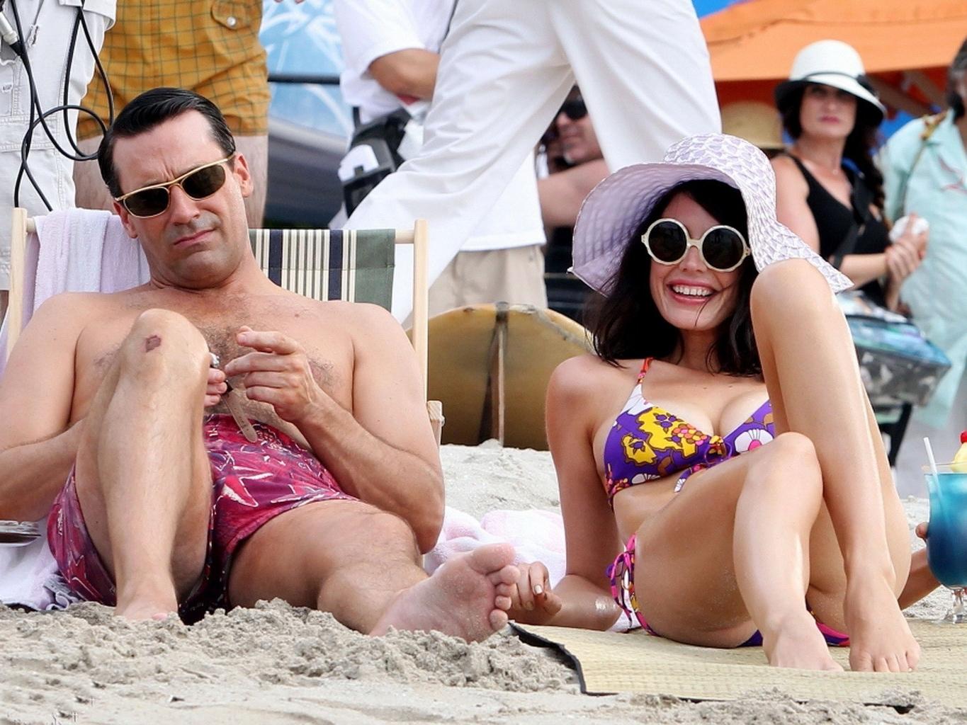10P Jessica Pare showing off her hot body in a skimpy colorful bikini on the set of 