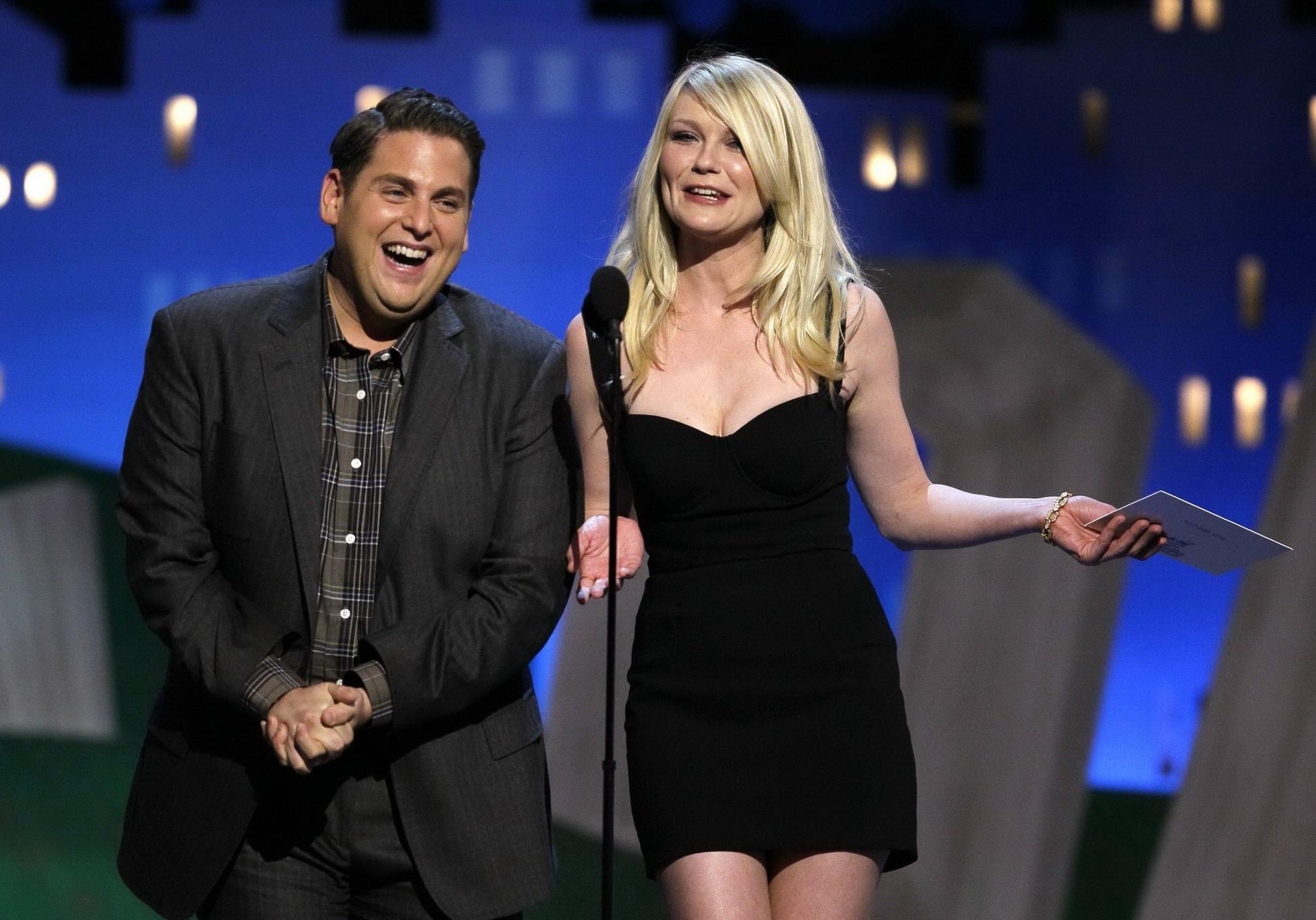 16P Kirsten Dunst leggy wearing a black mini dress at the Film Independent Spirit Aw