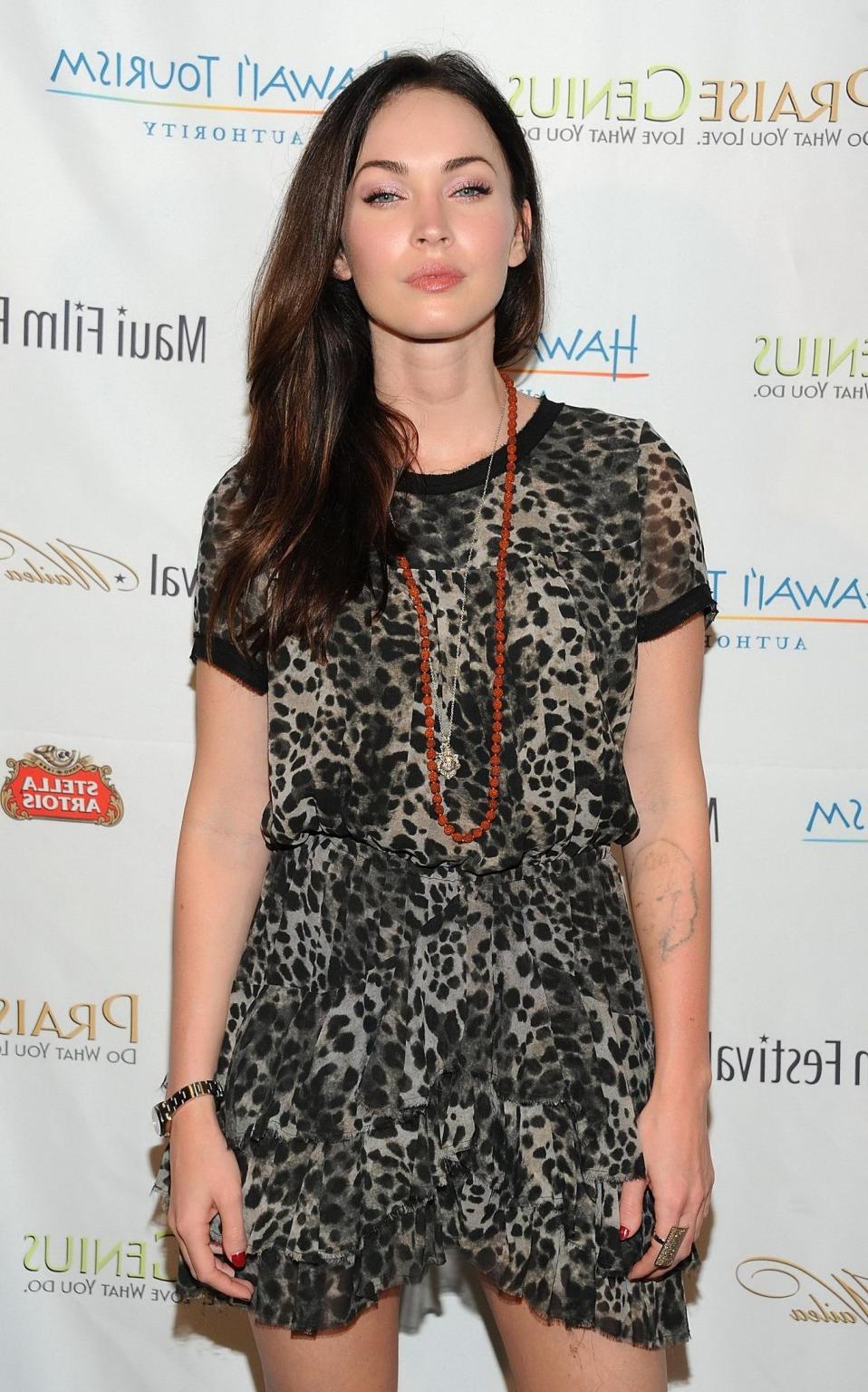 16P Megan Fox leggy wearing cheetah print mini dress at Maui Film Festival in Wailea