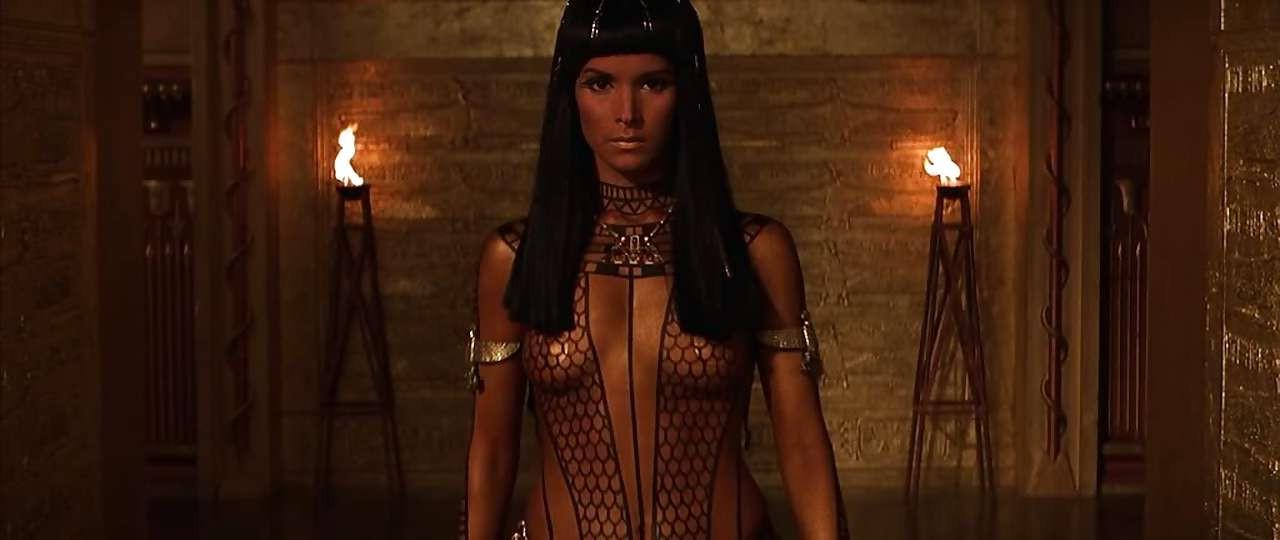 16P Patricia Velasquez showing her nice tits and ass in movie