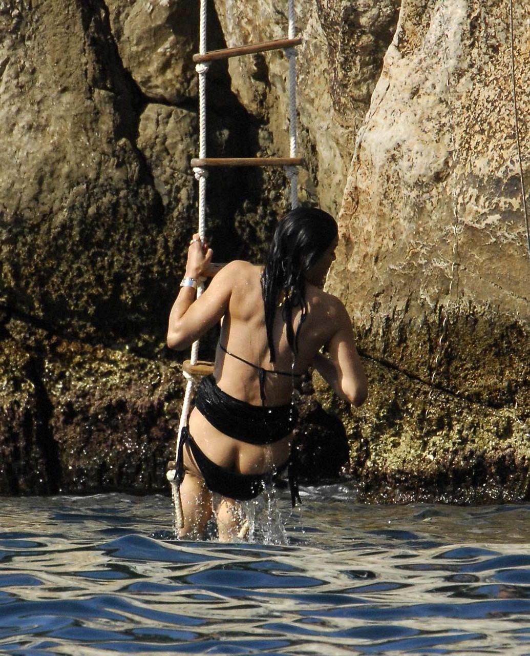 16P Michelle Rodriguez exposing her bare ass on vacation in bikini paparazzi picture