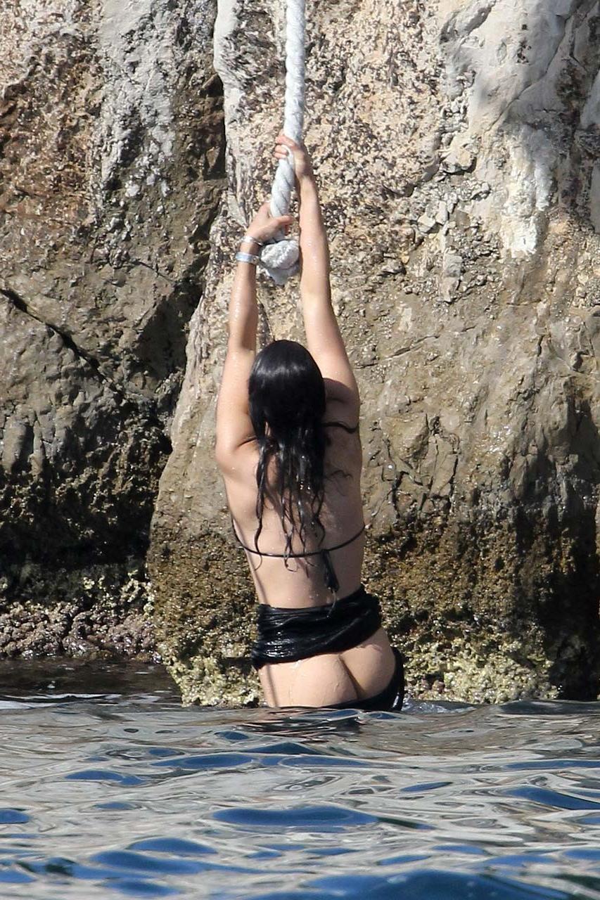 16P Michelle Rodriguez exposing her bare ass on vacation in bikini paparazzi picture