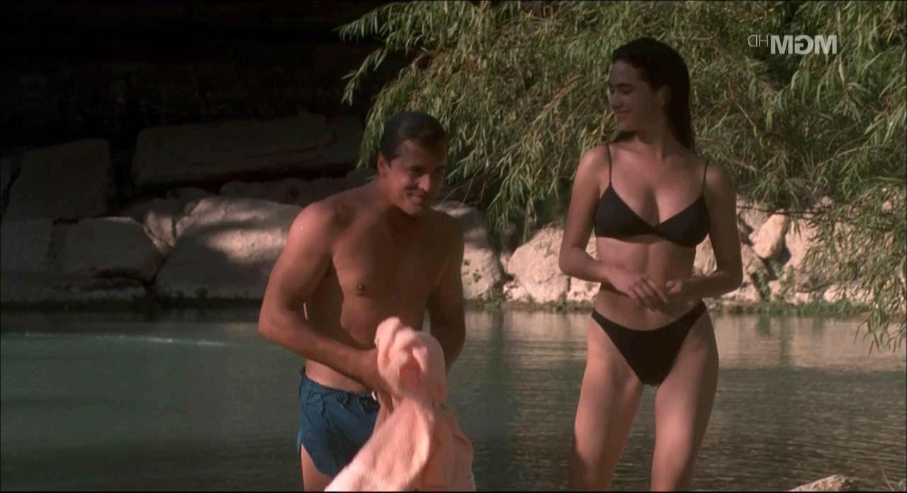 16P Jennifer Connelly showing her nice boobs and pussy from behind on beach in movie