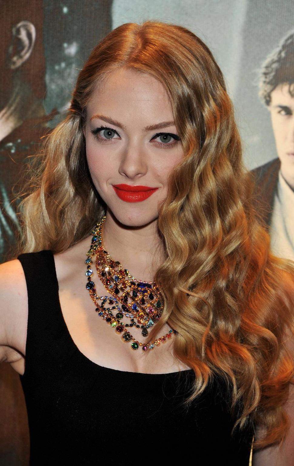 16P Amanda Seyfried leggy wearing little black dress at the 'Red Riding Hood' screen