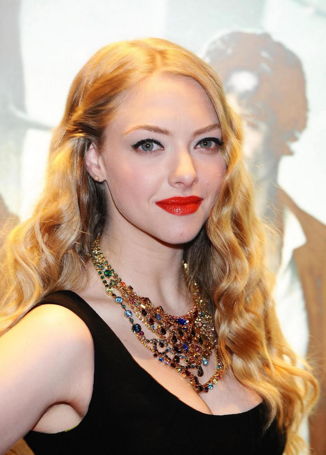16P Amanda Seyfried leggy wearing little black dress at the 'Red Riding Hood' screen