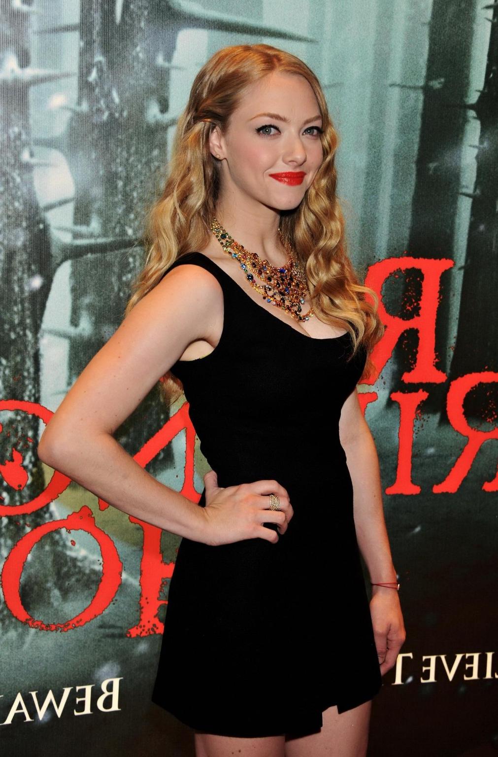 16P Amanda Seyfried leggy wearing little black dress at the 'Red Riding Hood' screen