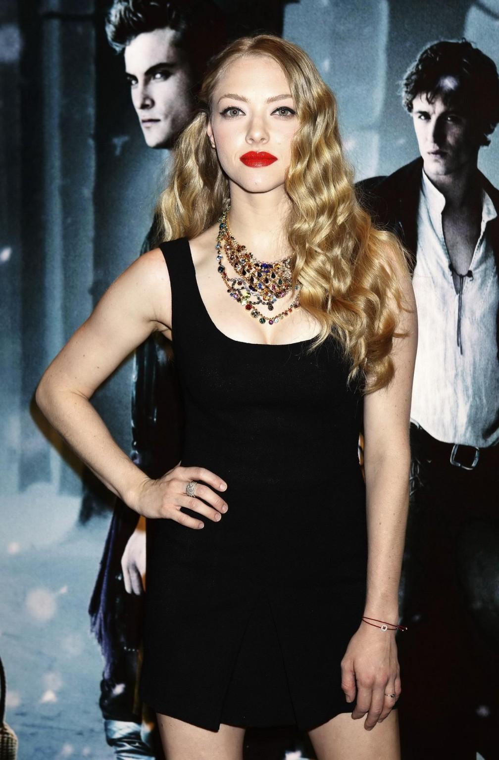 16P Amanda Seyfried leggy wearing little black dress at the 'Red Riding Hood' screen