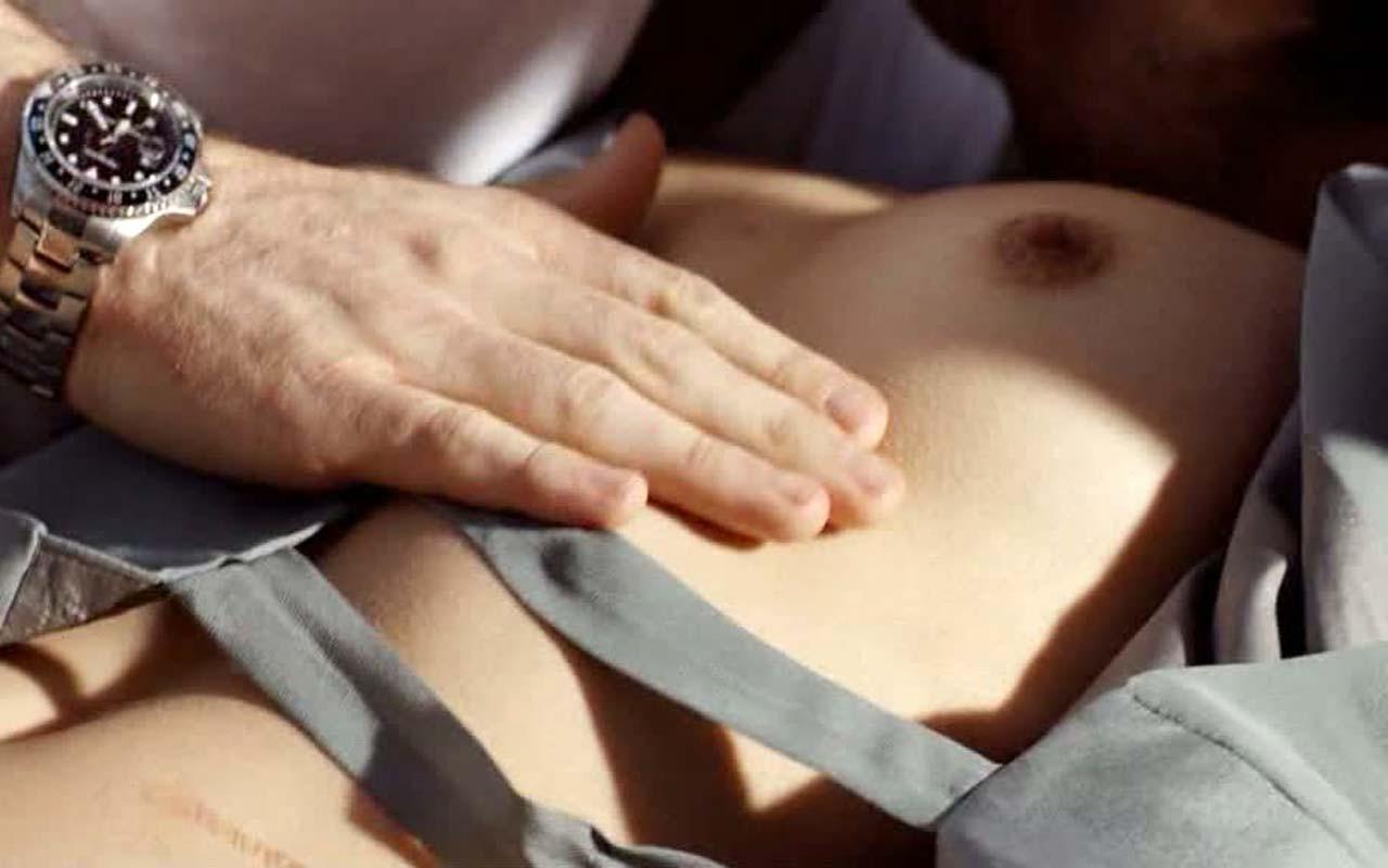 10P Lili Bordan exposing her nice big boobs in nude movie scenes and in bikini posin