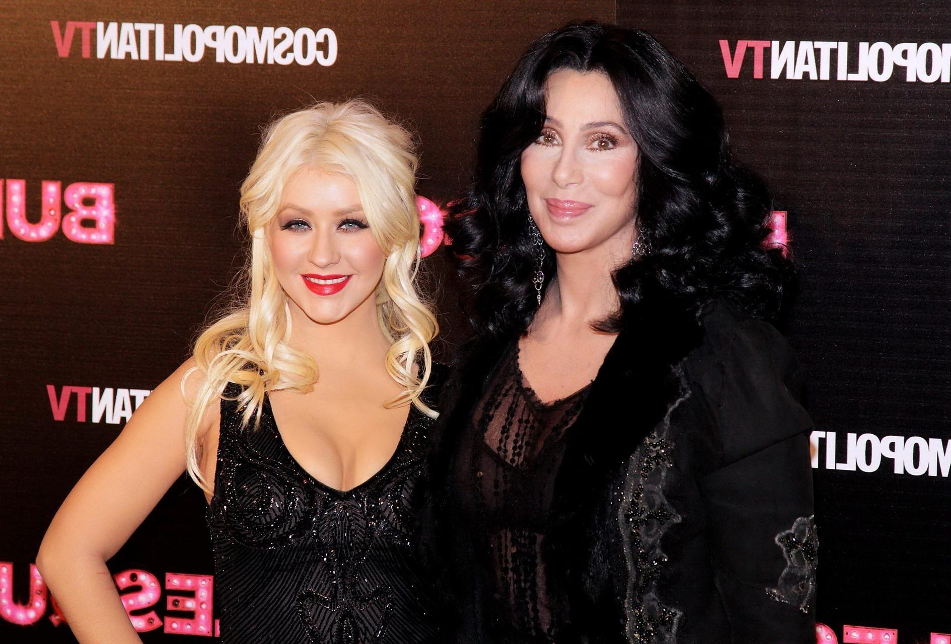16P Christina Aguilera cleavy  Cher in see-through bra at the Burlesque premiere in 