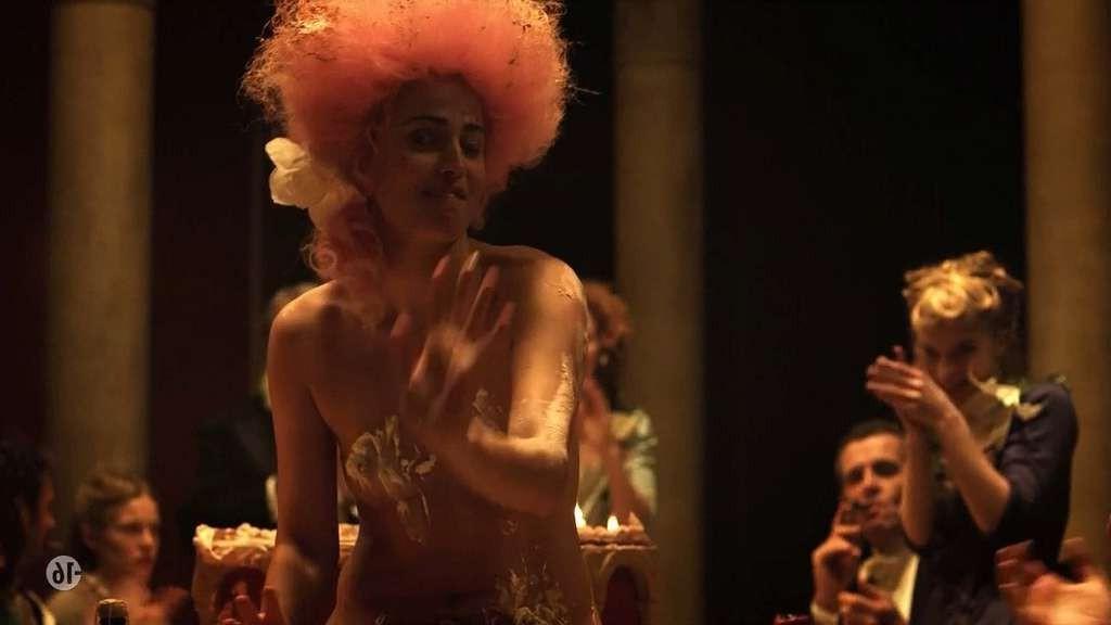 10P Anne Charrier exposing her nice tits and in stockings in nude movie scene