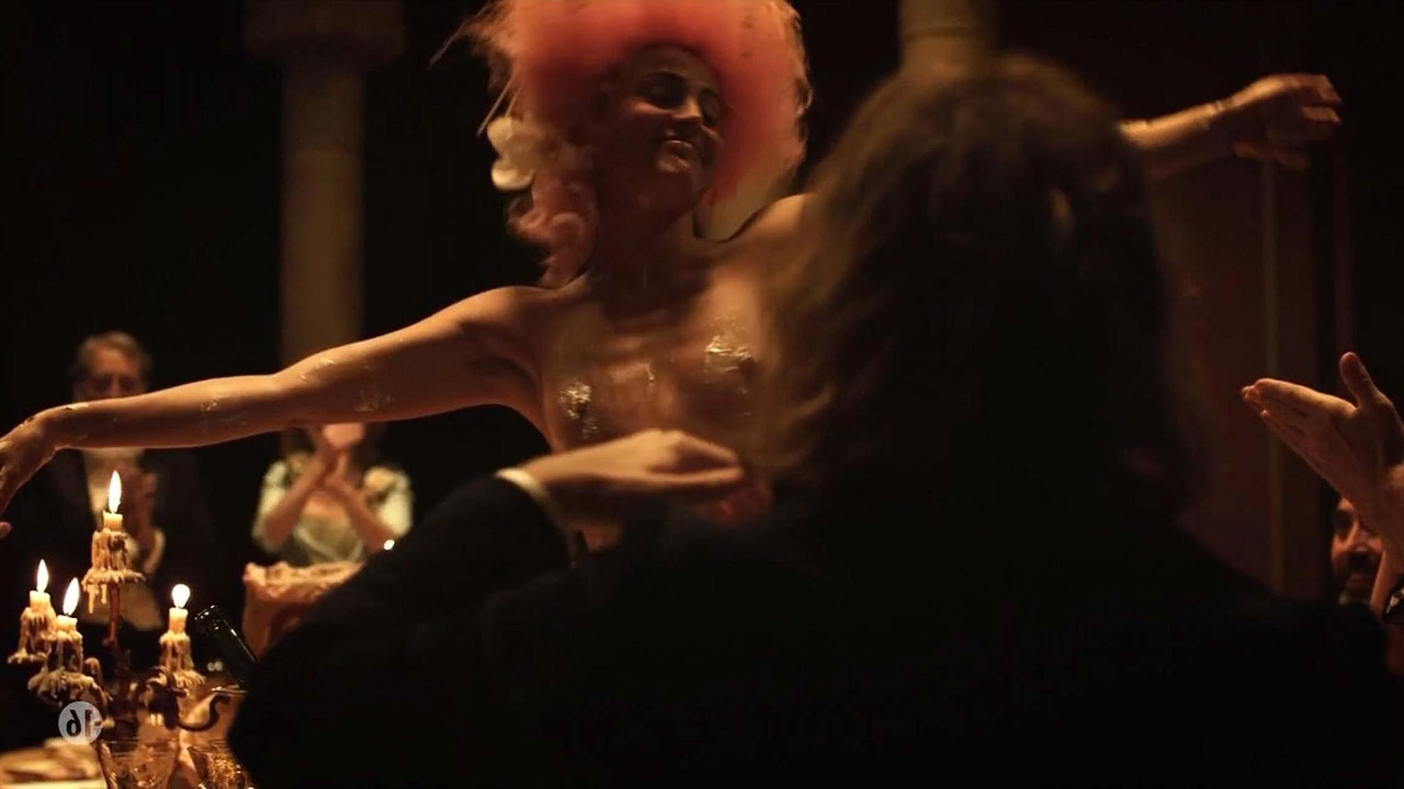 10P Anne Charrier exposing her nice tits and in stockings in nude movie scene