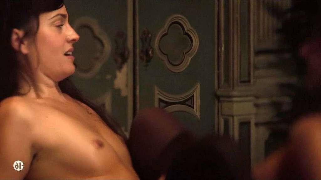 10P Anne Charrier exposing her nice tits and in stockings in nude movie scene