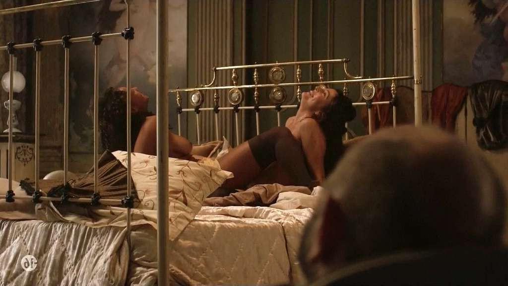 10P Anne Charrier exposing her nice tits and in stockings in nude movie scene