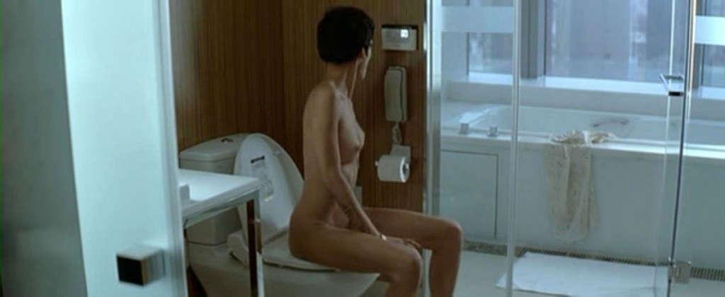 10P Omahyra Mota showing her nice big tits in nude movie scene