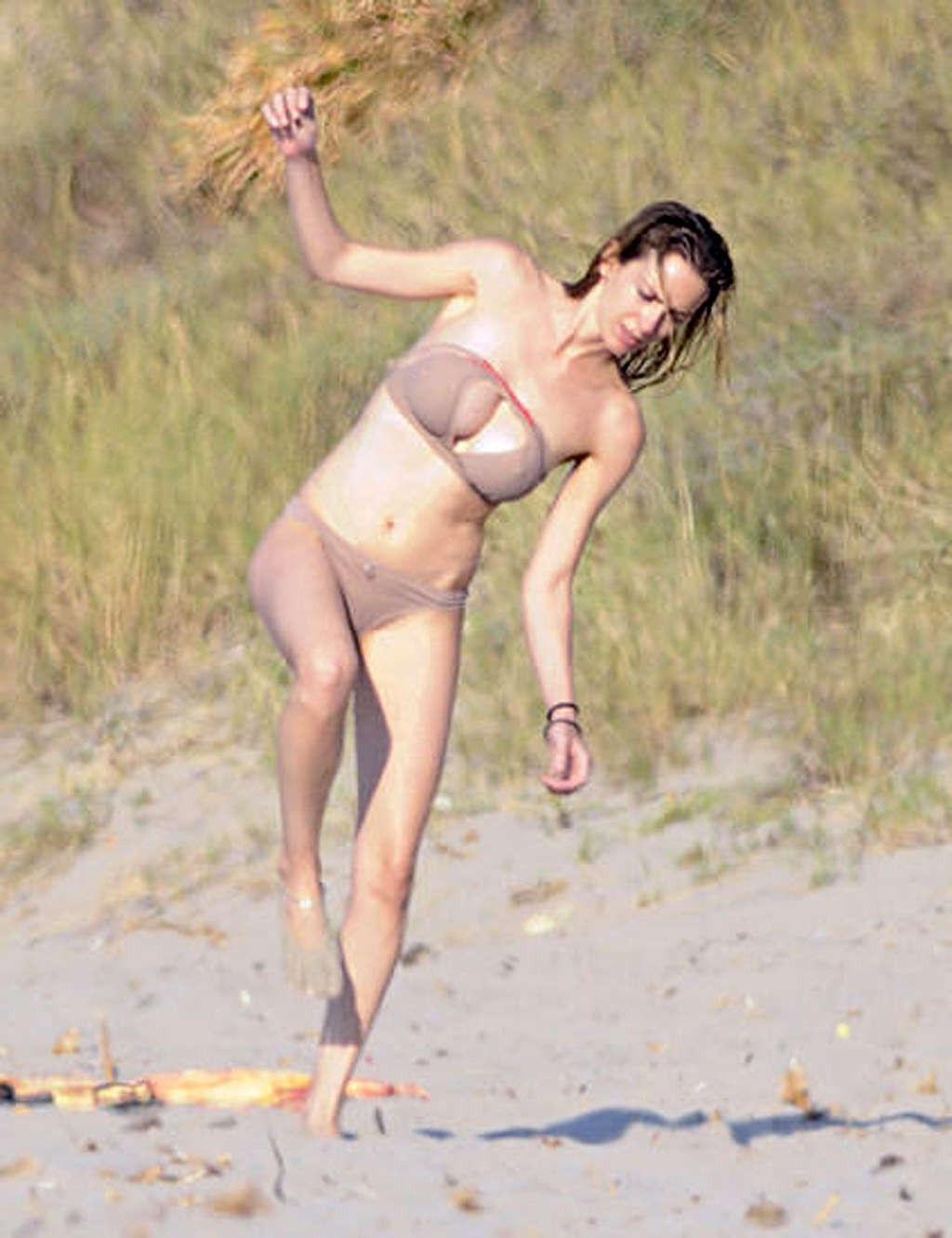 10P Kira Miro showing her nice big tits in movie and looking sexy in bikini