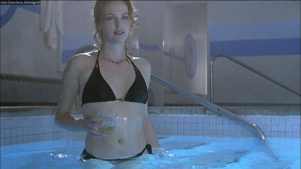 10P Charlize Theron exposing her nice boobs and spread legs wide in movie
