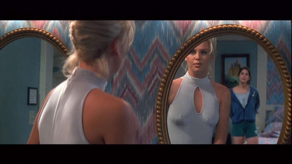 10P Charlize Theron exposing her nice boobs and spread legs wide in movie