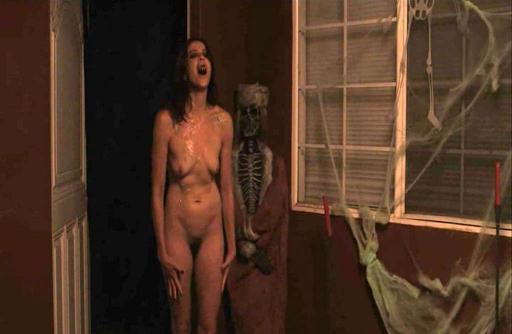 9P Elina Madison exposing her nice tits and hairy pussy in movie