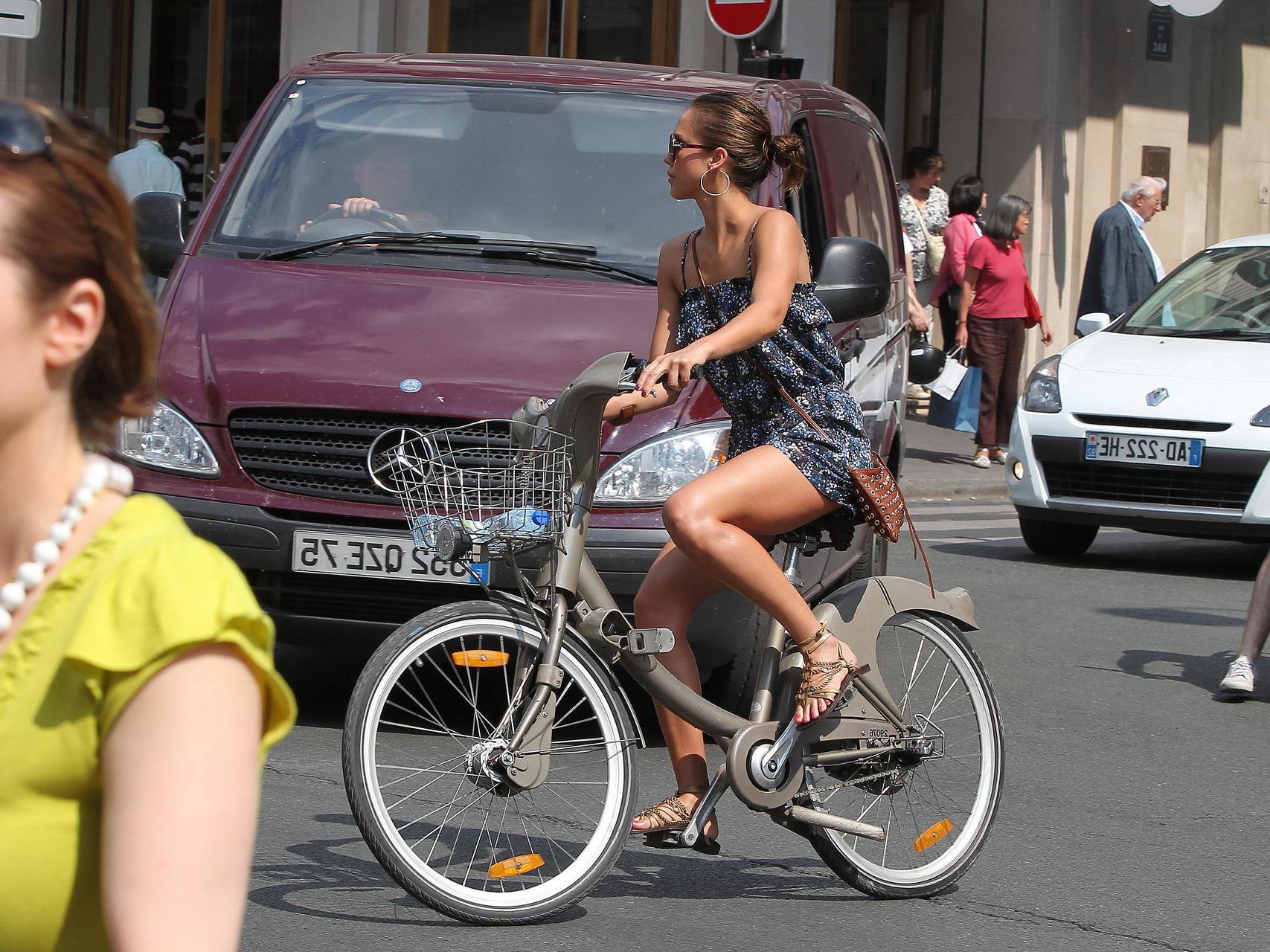16P Jessica Alba leggy in Paris - riding a bike in mini dress