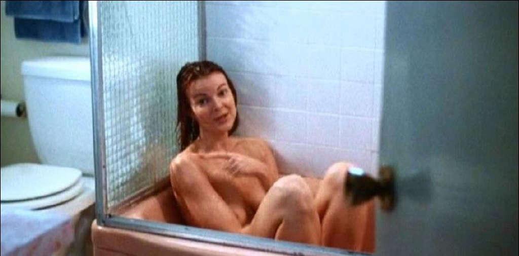 10P Marcia Cross exposing her nice big tits and her pussy in movie caps