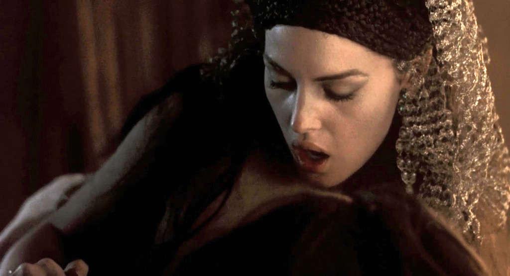 10P Monica Bellucci reveals her nice big boobs in movie caps