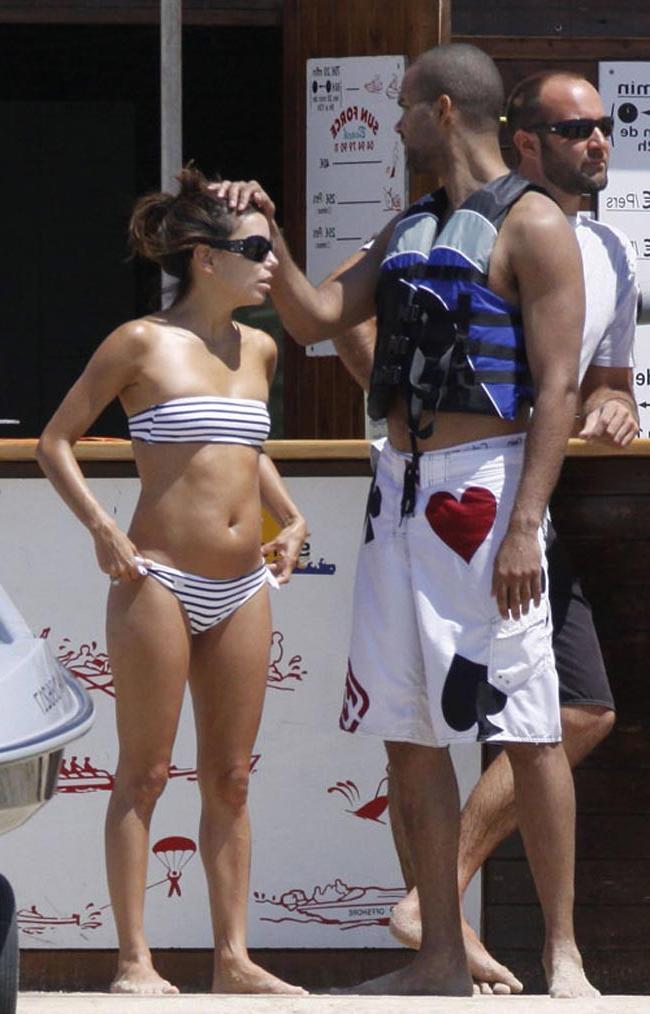 12P Eva Longoria posing in fetish latex lingerie