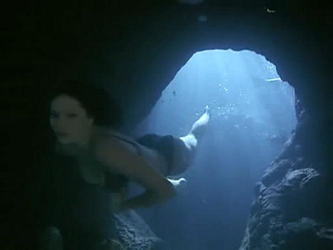 15P Simmone MacKinnon looking very sexy in bikini in some movie caps