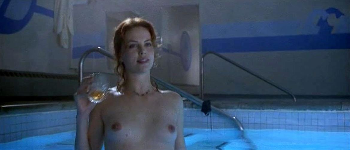 10P Charlize Theron showing her nice big tits in nude movie caps