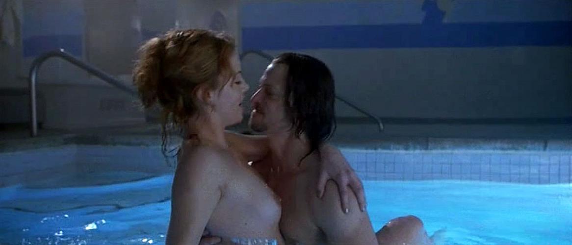 10P Charlize Theron showing her nice big tits in nude movie caps