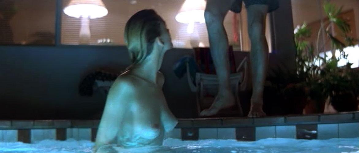 16P Natasha Henstridge showing her big tits in nude movie caps
