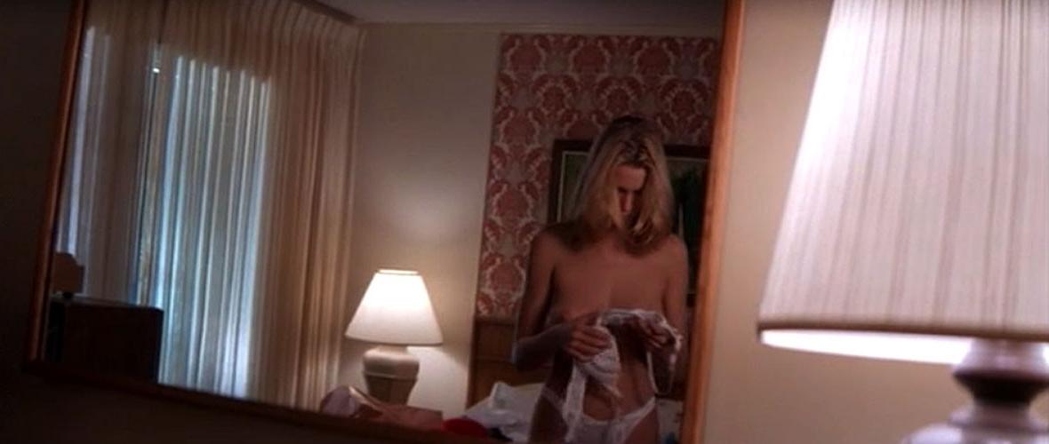 16P Natasha Henstridge showing her nice big tits in nude movie caps