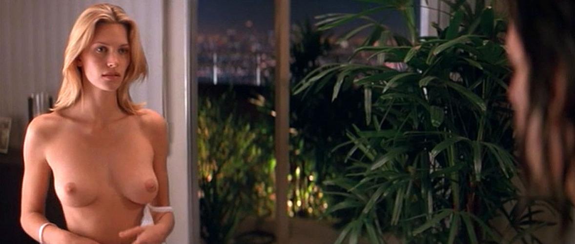 16P Natasha Henstridge showing her nice big tits in nude movie caps