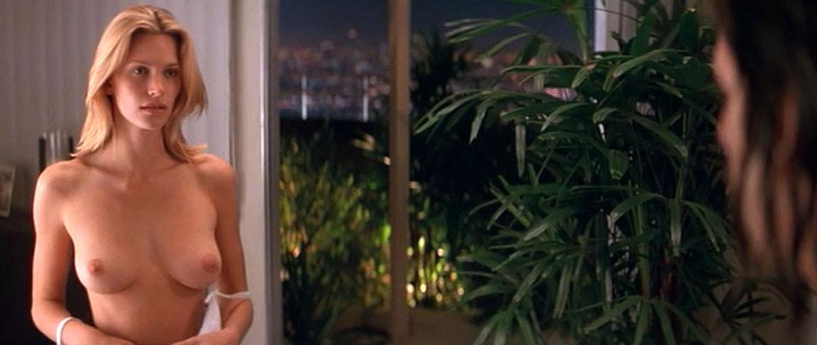 16P Natasha Henstridge showing her nice big tits in nude movie caps