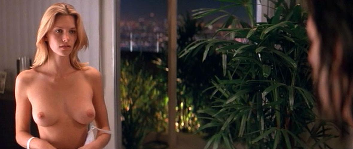 16P Natasha Henstridge showing her nice big tits in nude movie caps