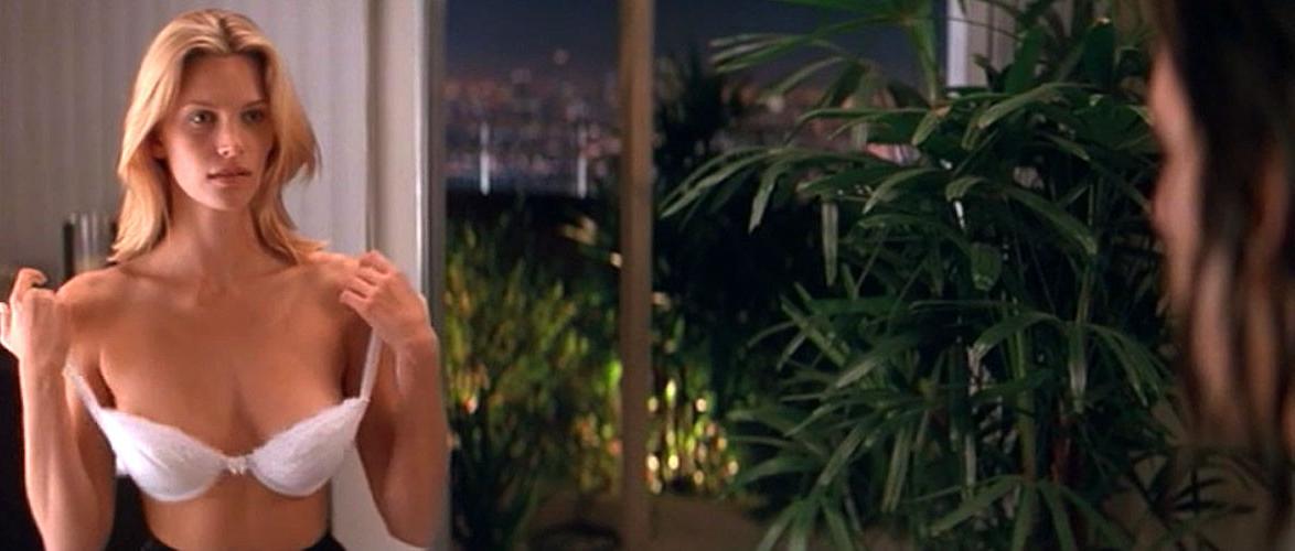 16P Natasha Henstridge showing her nice big tits in nude movie caps