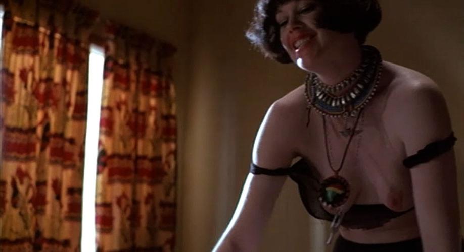 16P Melanie Griffith showing her nice big tits in nude movie caps