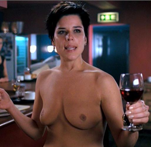 16P Neve Campbell showing her nice big tits in movie