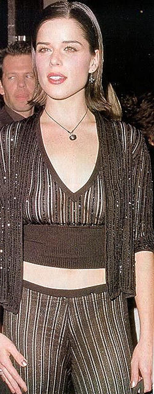 16P Neve Campbell showing her nice big tits in movie