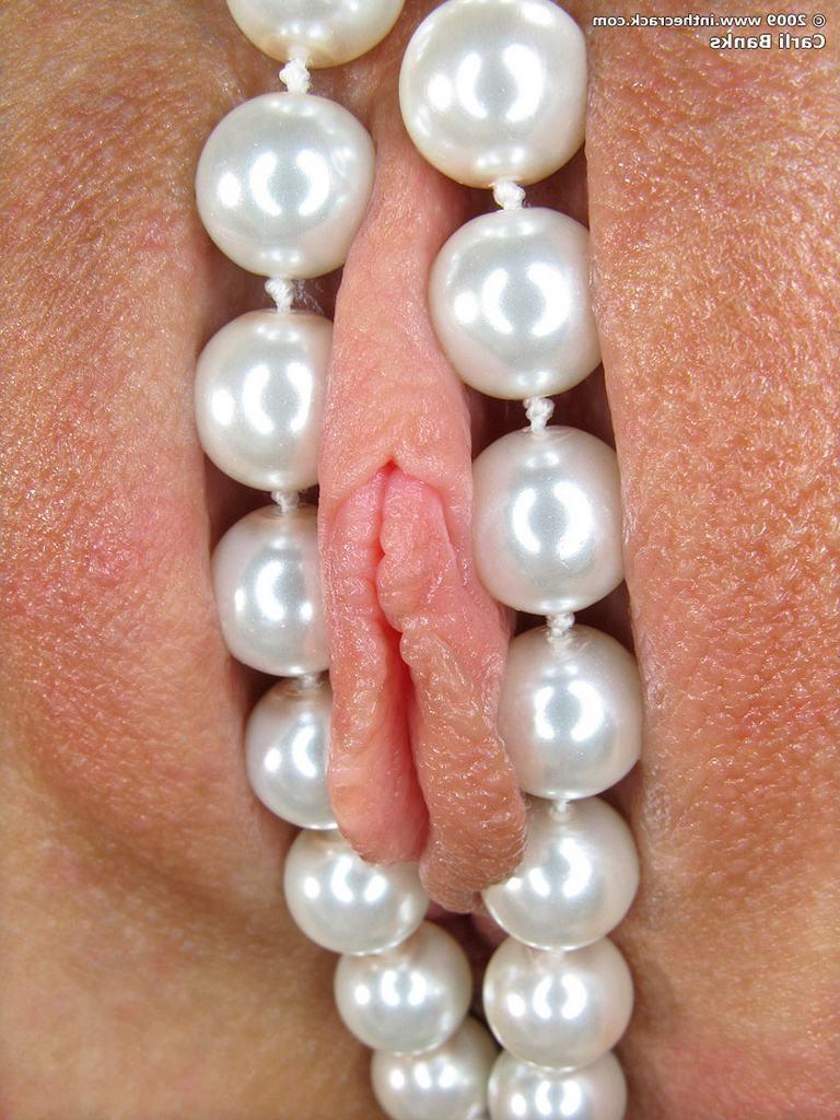 15P Carli Banks rubbing and filling pussy with pearls