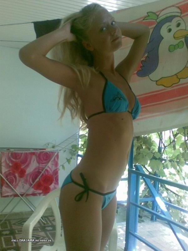 14P Sexy blonde babe posing sexy while on vacation